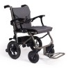 Silla de ruedas eléctrica E-Foldi Lite plegada de forma ultra compacta.