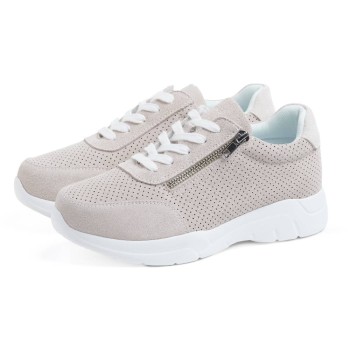 Zapato deportivo de mujer en color beige/azul con acabado discreto, picado lateral