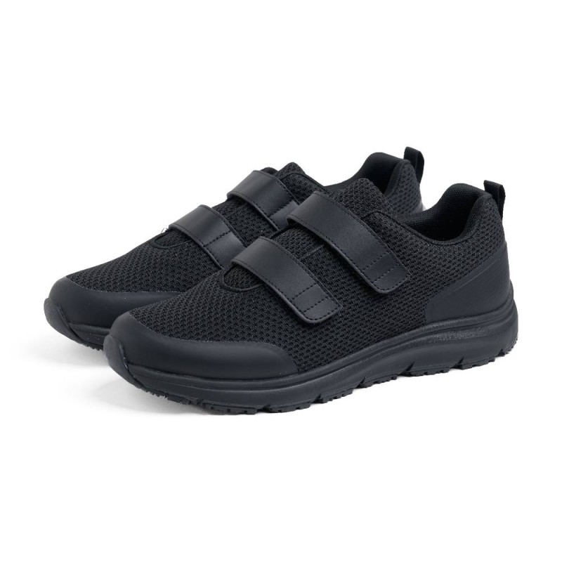 Un par de zapatillas deportivas laborales unisex de color negro mate, con tejido de malla transpirable
