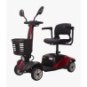 Scooter de movilidad eléctrico compacto Veovita en color rojo con cesta frontal y retrovisores.