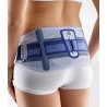 Faja sacroilíaca Bauerfeind SacroLoc con cinturones de tracción.